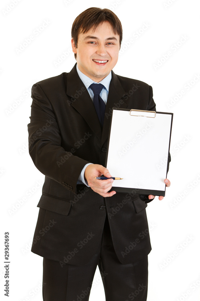 Smiling modern businessman with documents and pen for signing Smiling modern businessman with documents and pen for signing
