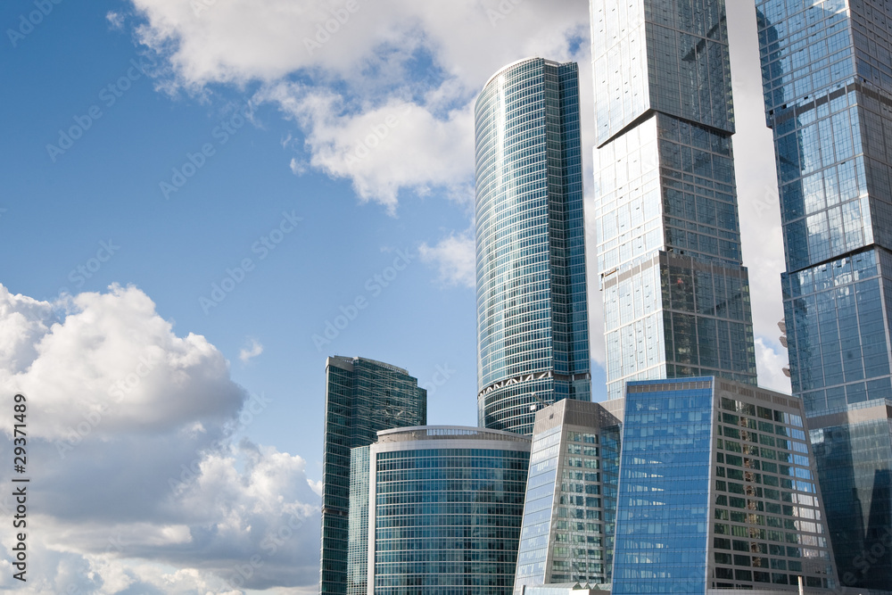 Many scyscrapers of Moscow city under blue sky