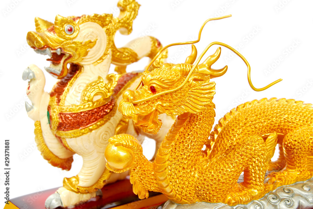 Fototapeta premium Golden and Lion statue isolated