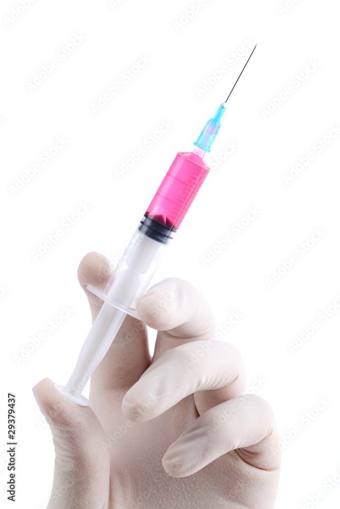 Doctor hand with medical syringe Doctor hand with medical syringe