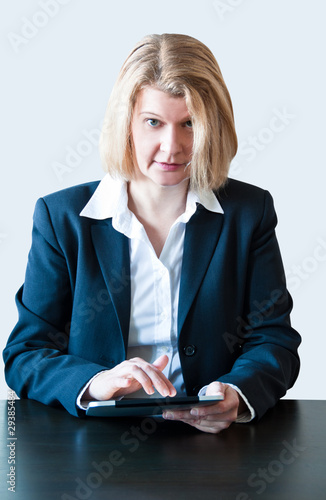 Closeup of a business woman with tablet pc and headset photo