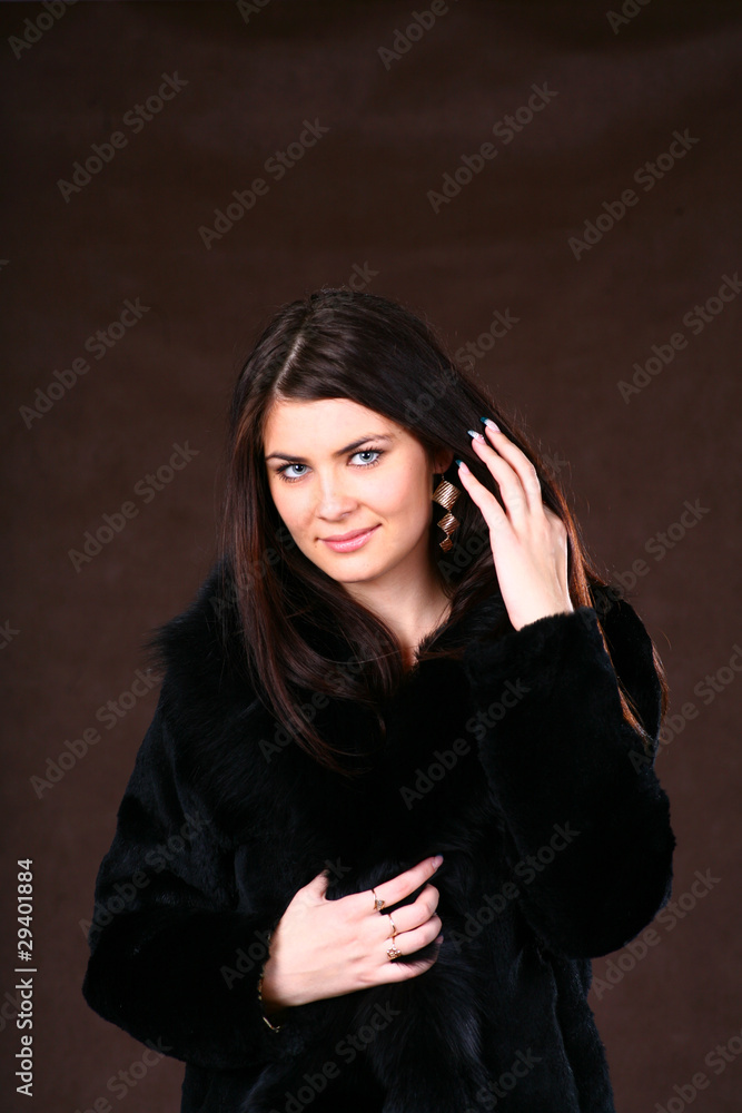 Beautiful Young Woman In A Fur Coat. Beautiful Young Woman In A Fur Coat.