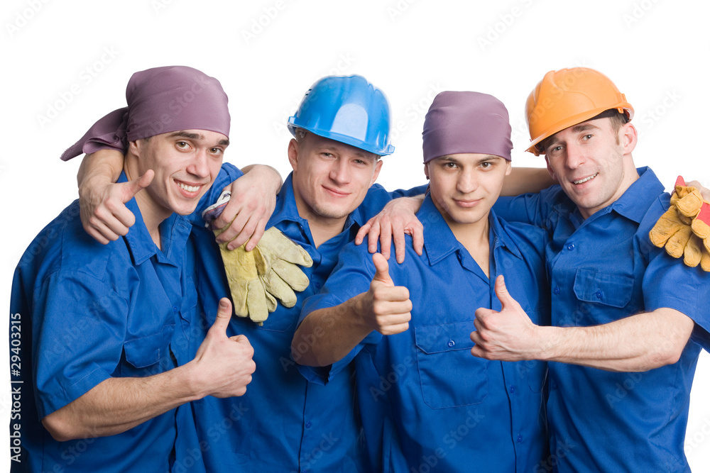 Friendly young team of construction workers Friendly young team of construction workers