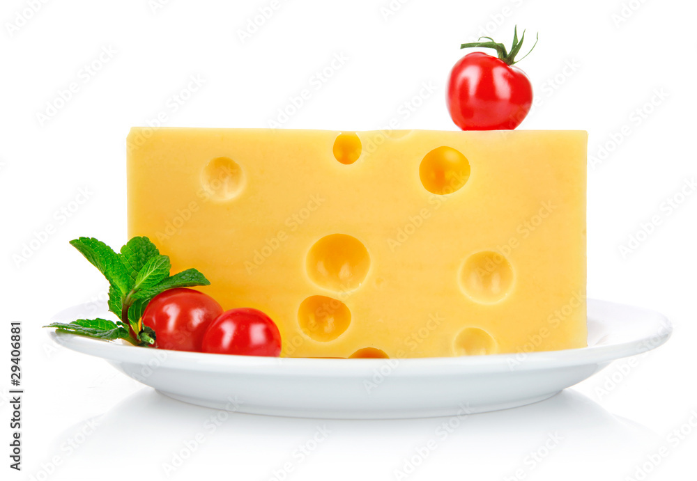 yellow cheese in plate with tomatoes and leaf
