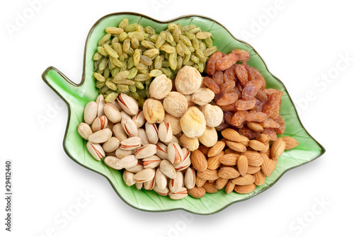 Dry fruits in leaf plate photo