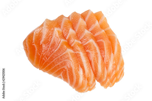 Slices of raw salmon used in sashimi isolated on white photo