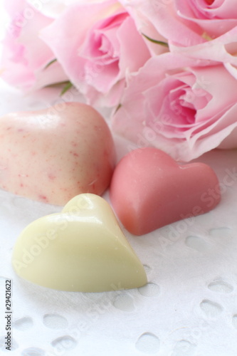 Pink roses and heart shaped chocolate