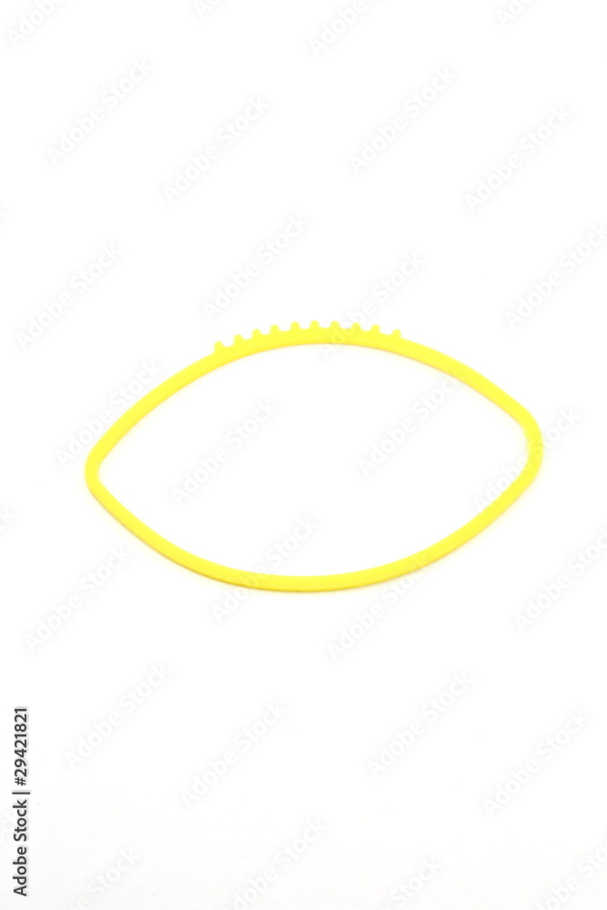 Yellow rubber band outline of a football Yellow rubber band outline of a football