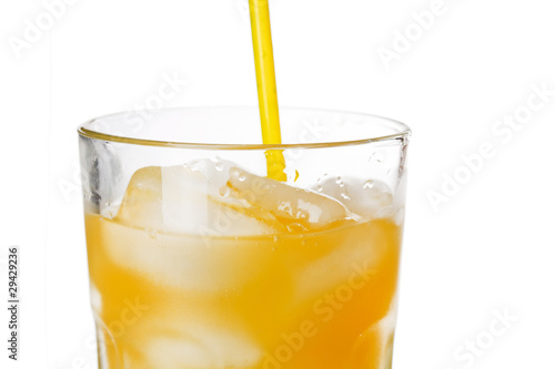 glass of orange juice with ice