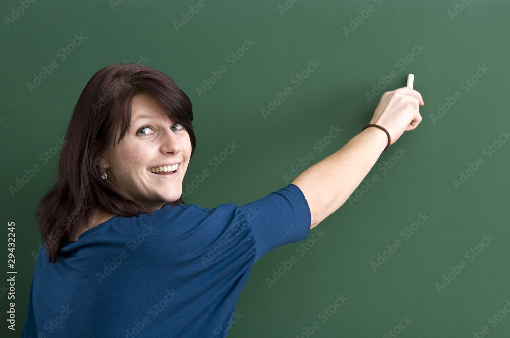 Women Teacher at the backboard