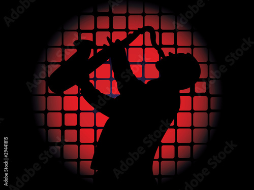 Silhouette of saxophone player on luminous red background