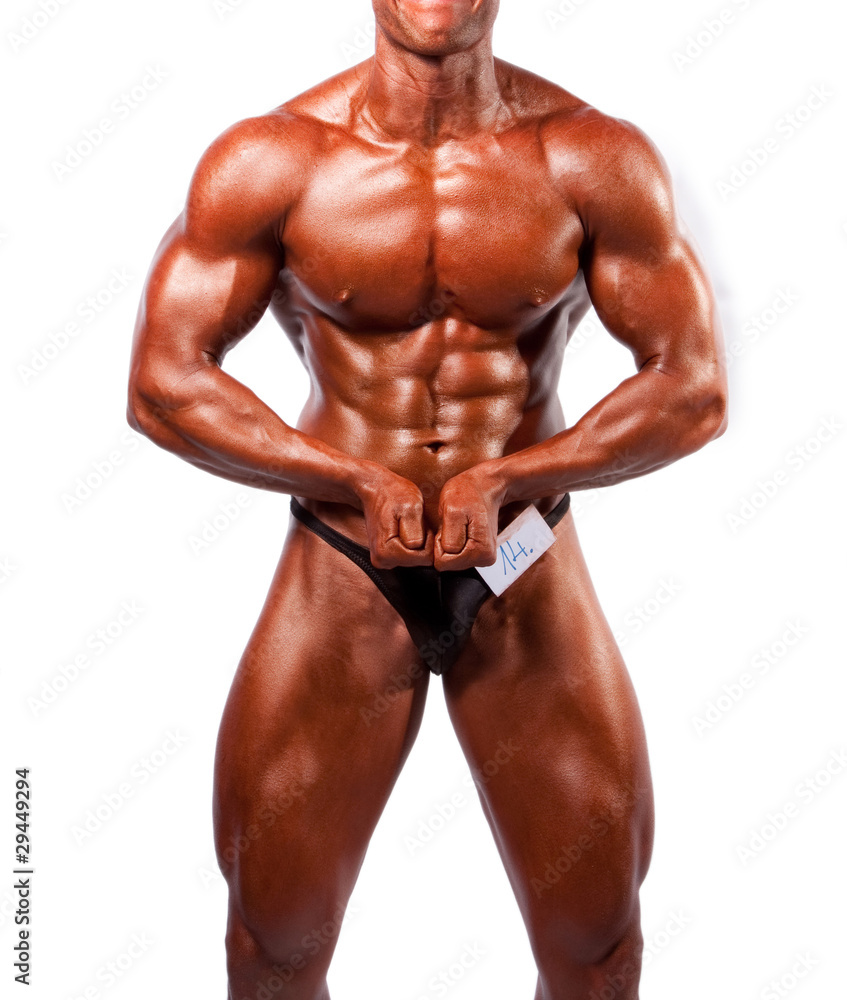 bodybuilder posing over white background