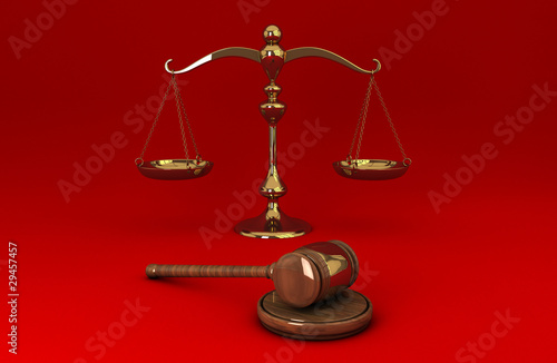 Golden scale and gavel on red solid background