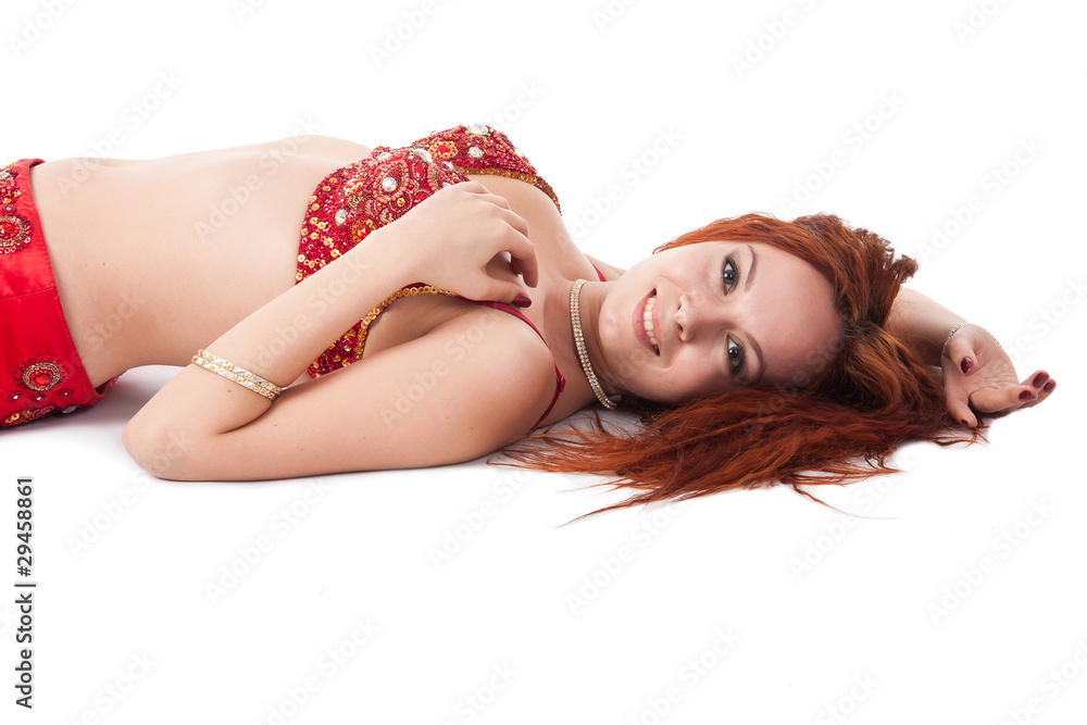 Fototapeta premium Young beautiful Belly Dancer isolated on white