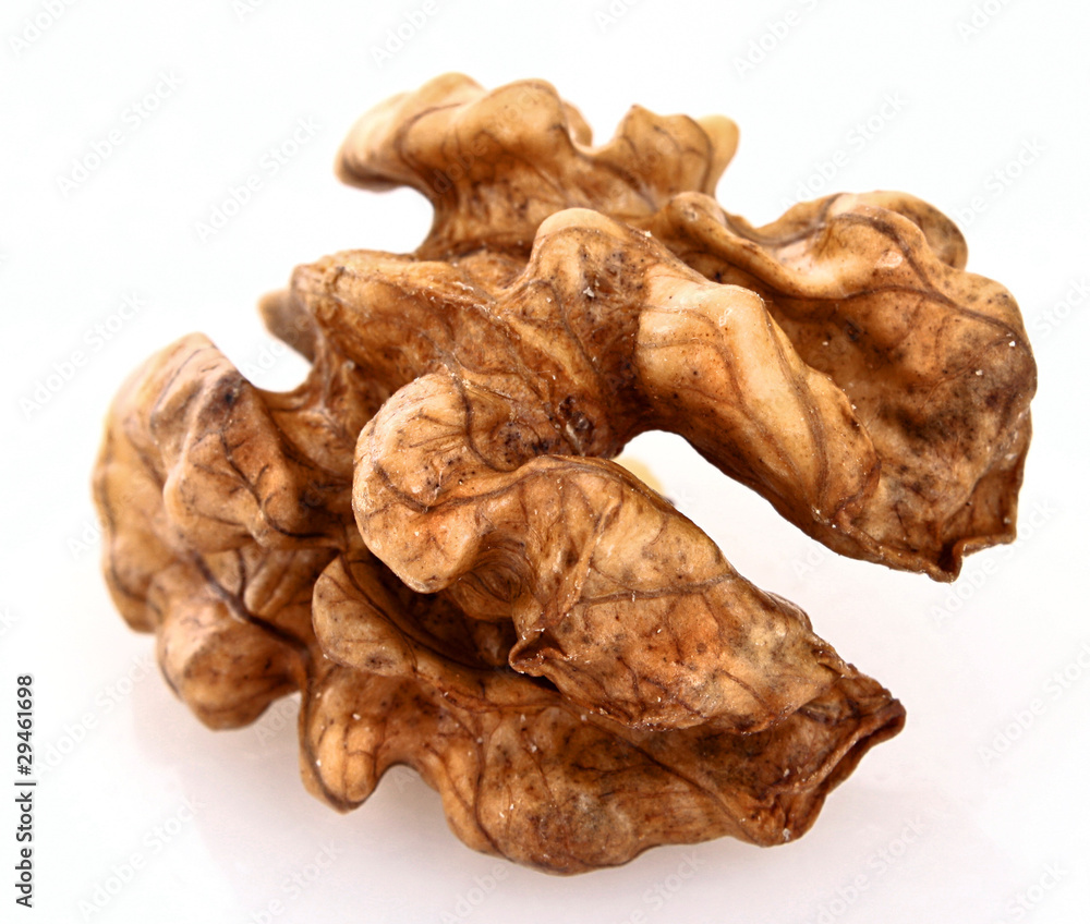 Closeup of a walnut isolated on white background Closeup of a walnut isolated on white background