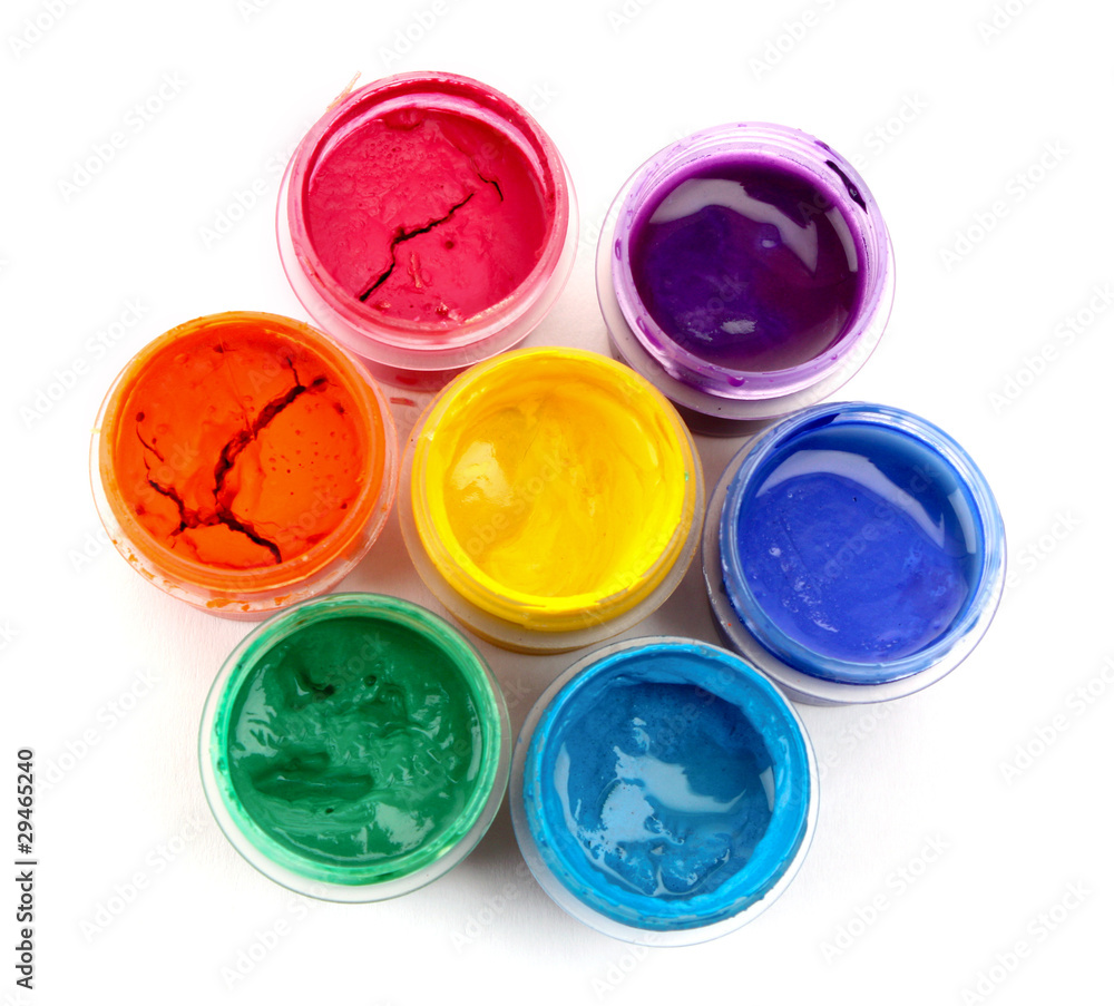 Colorful vibrant cans of gouache isolated on white Colorful vibrant cans of gouache isolated on white