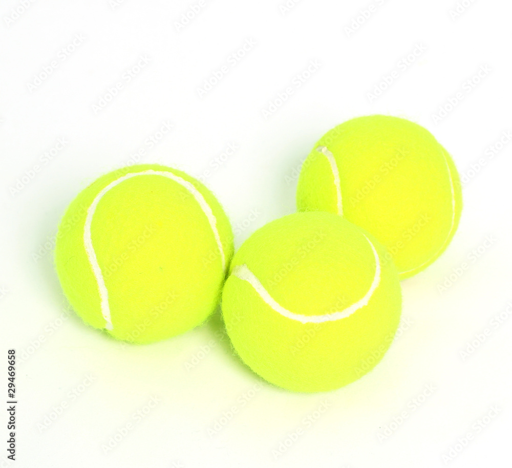 group of three tennis balls