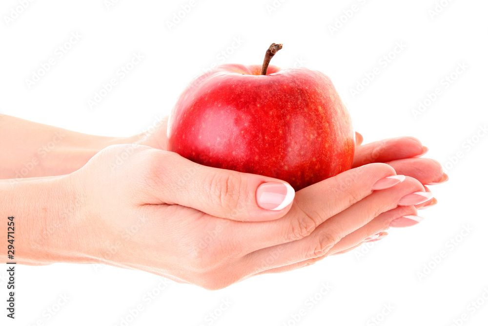 An apple on the hand on white background An apple on the hand on white background