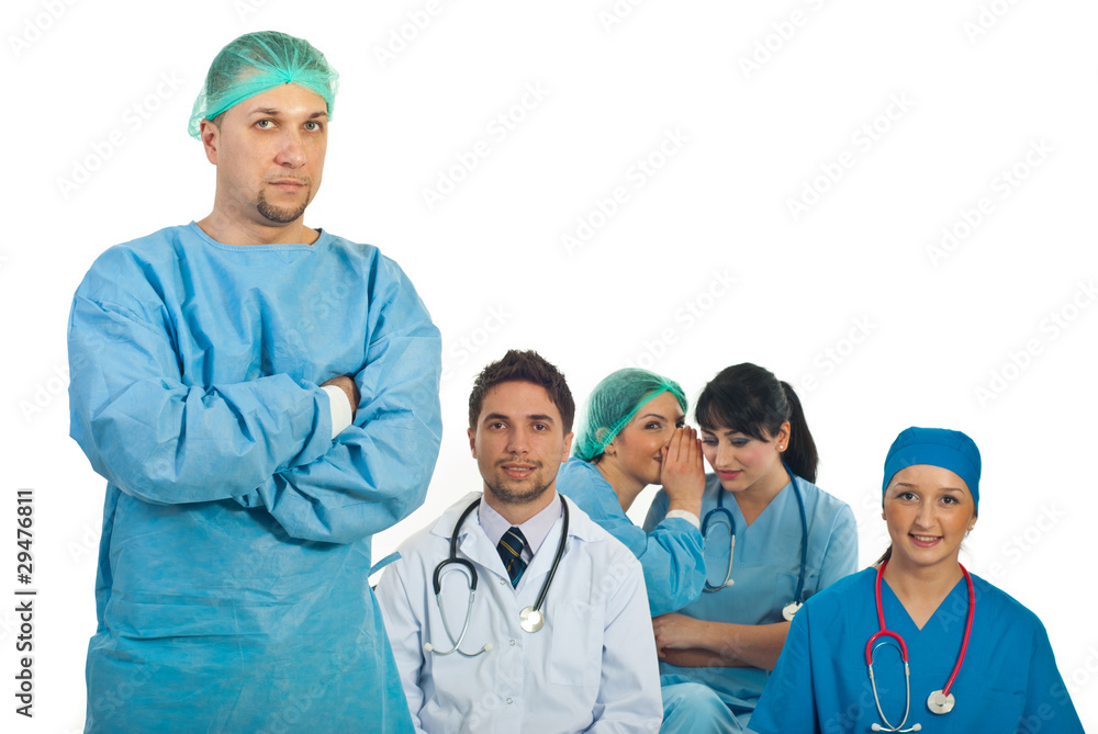 Surgeon man and gossip colleagues Surgeon man and gossip colleagues