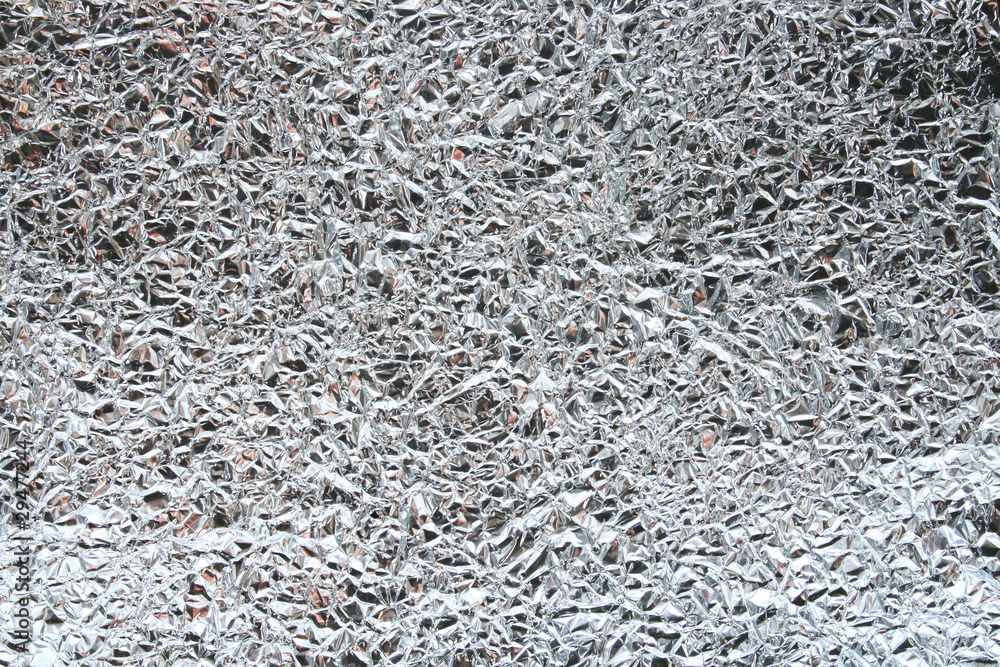 Pattern of Wrinkled Food Aluminum Foil Paper using as background Pattern of Wrinkled Food Aluminum Foil Paper using as background