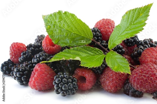 raspberries and blackberries on white background