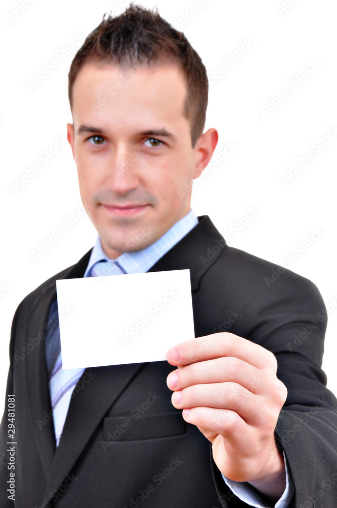 Young business man showing off his blank business card Young business man showing off his blank business card