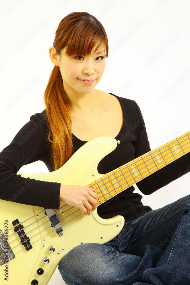 Fototapeta premium young woman with a 5 strings bass