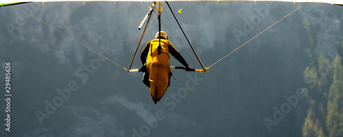 Hang-gliding over a valley