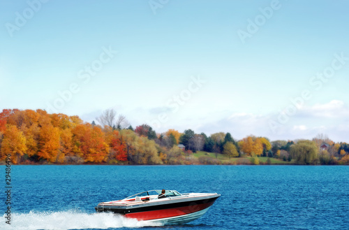 power boating on an autumn lake