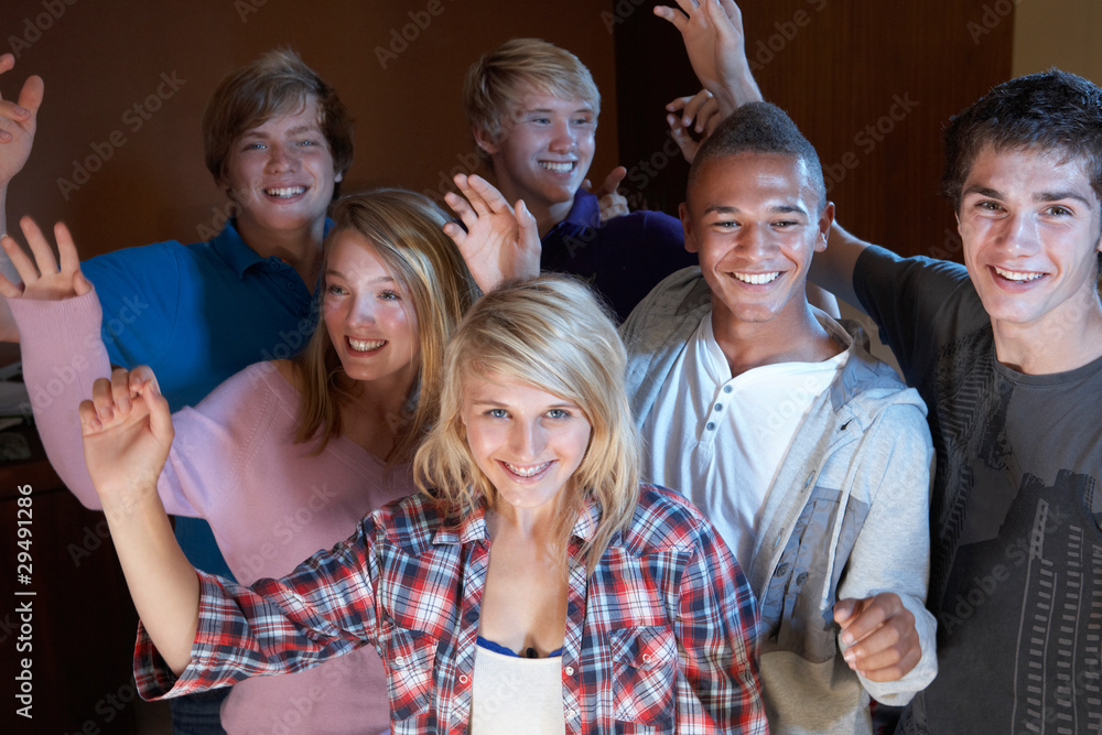 Fototapeta premium Group Of Teenage Friends Dancing And Drinking Alcohol