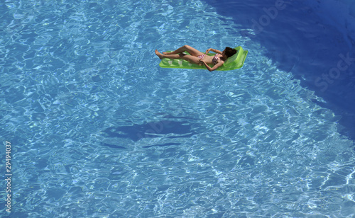 woman relax at swimming pool
