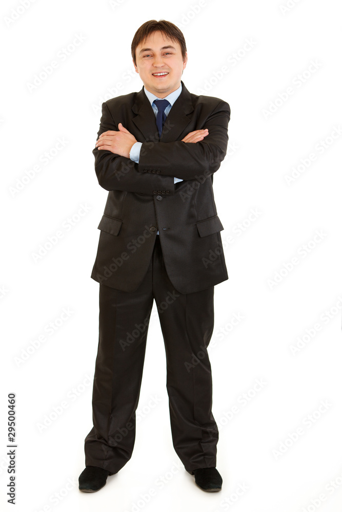 Smiling elegant businessman with crossed arms on chest Smiling elegant businessman with crossed arms on chest