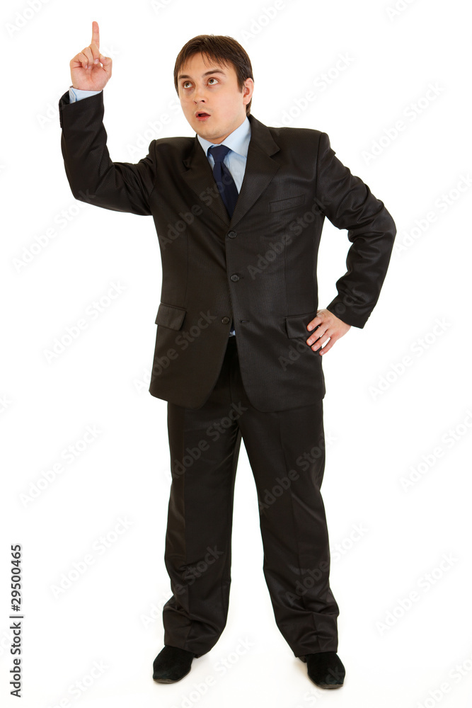 Modern businessman with rised finger. Idea gesture. Modern businessman with rised finger. Idea gesture.