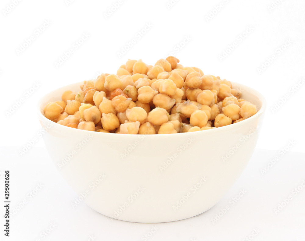 Cooked chickpea in white bowl detail Cooked chickpea in white bowl detail