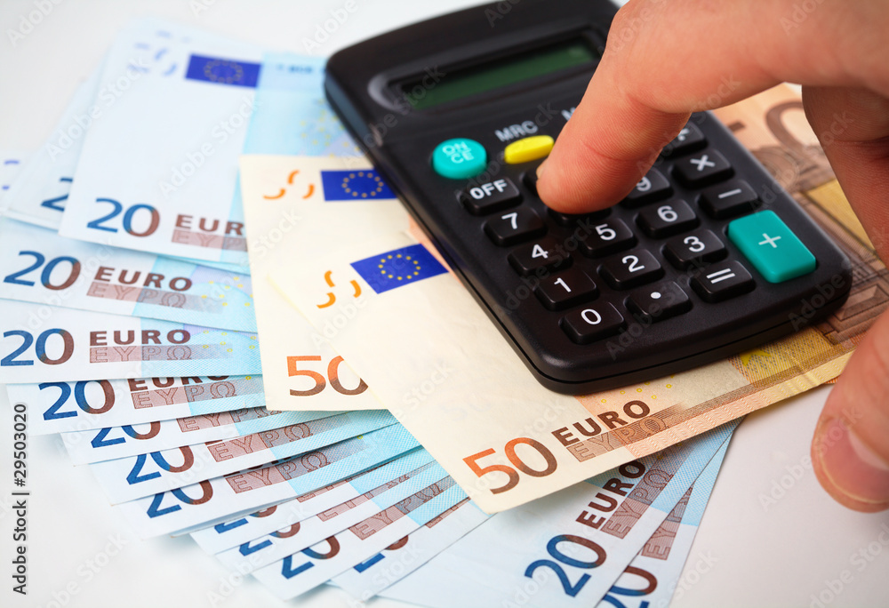 Calculator and money - accounting concept Calculator and money - accounting concept