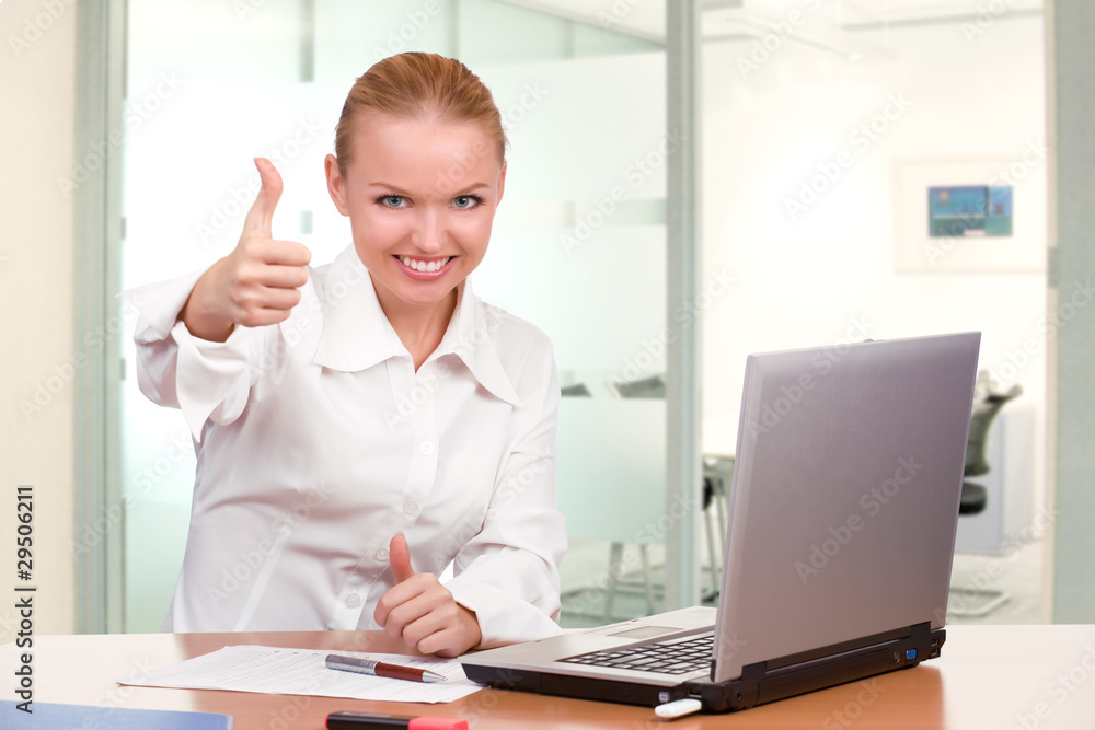 businesswoman showing thumb up businesswoman showing thumb up