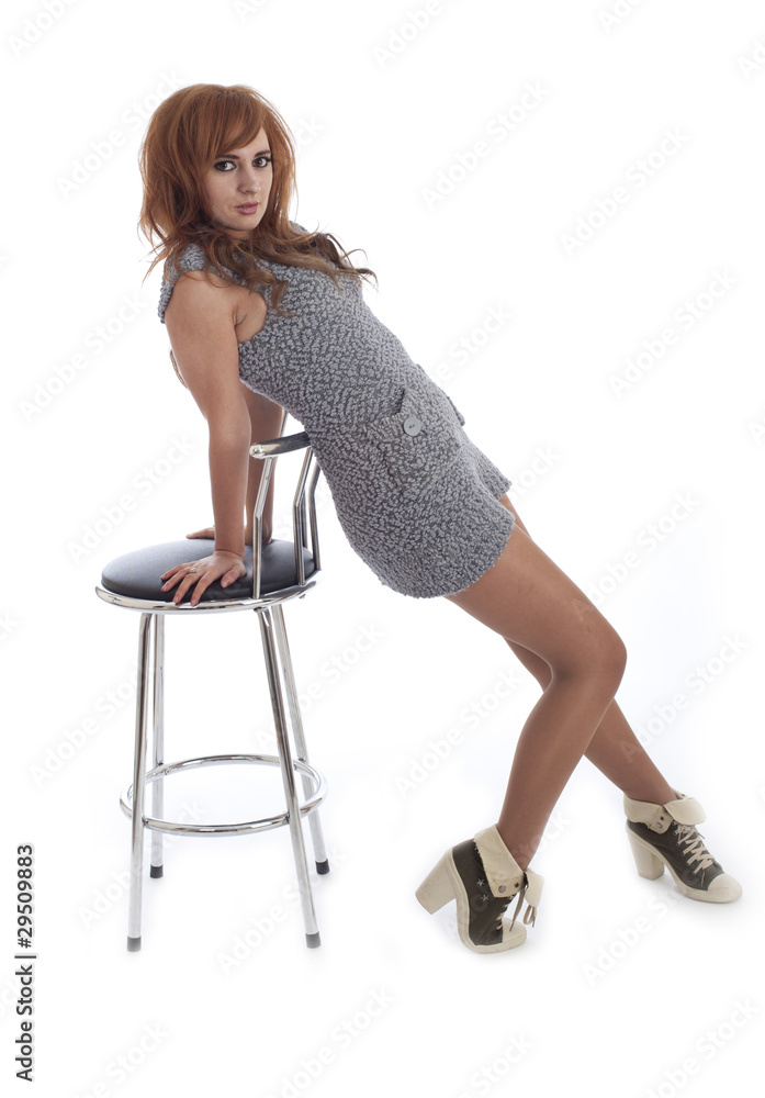 Cute young female with bar stool Cute young female with bar stool