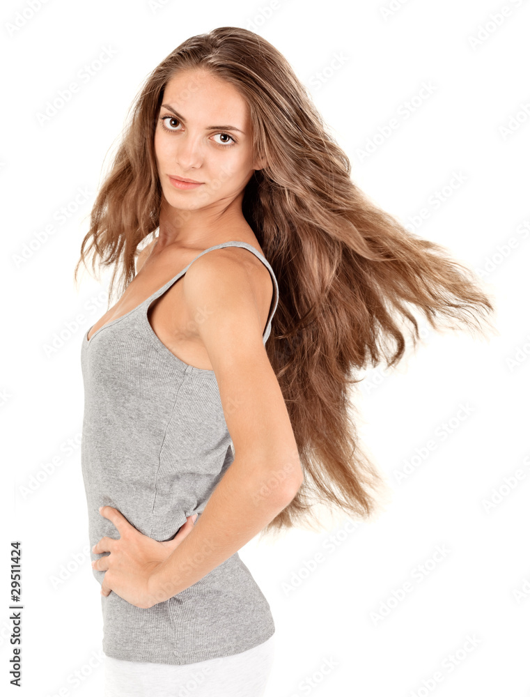 Young beautiful woman with flying long hairs Young beautiful woman with flying long hairs