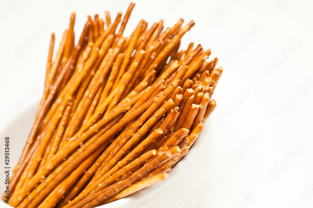 Salty pretzel sticks isolated on white background Salty pretzel sticks isolated on white background