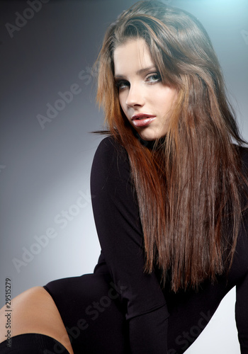 Glamour Portrait of sexy woman on grey background