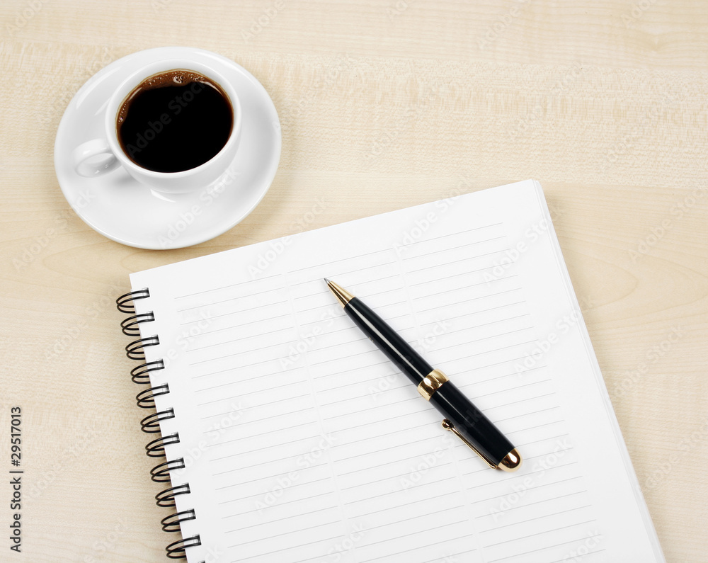 White cup and white page White cup and white page
