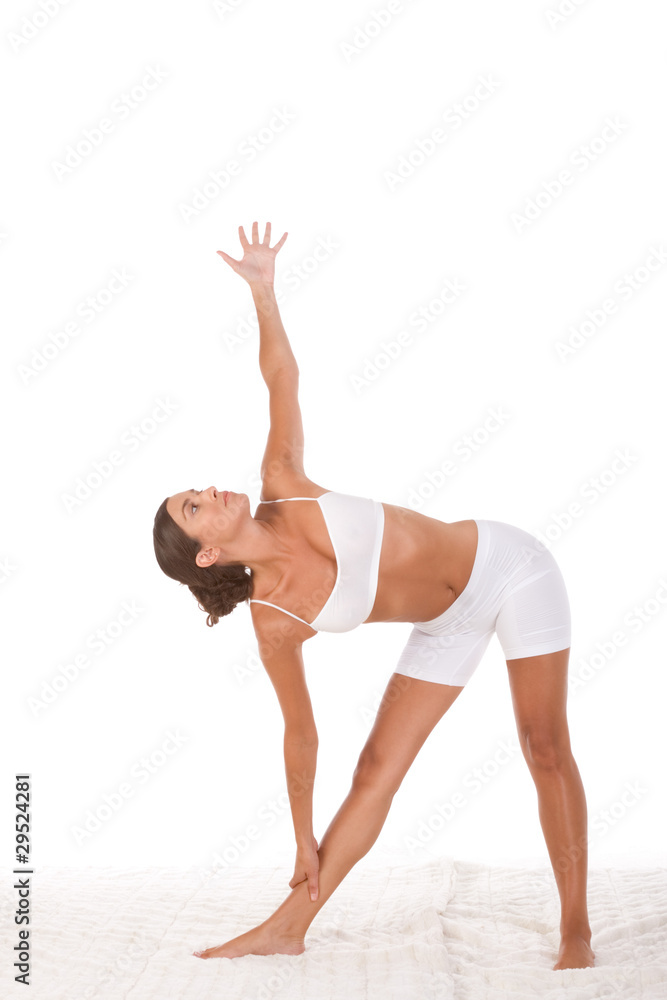 yoga pose - female in sport clothes performing exercise yoga pose - female in sport clothes performing exercise