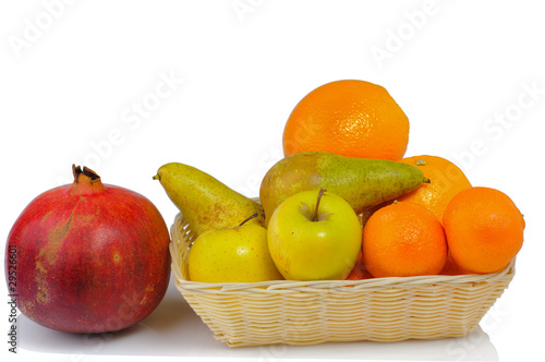 Fototapeta Naklejka Na Ścianę i Meble -  fresh fruit in a basket isolated on white background