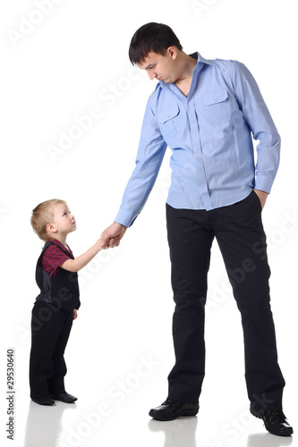 Handshake of man and boy