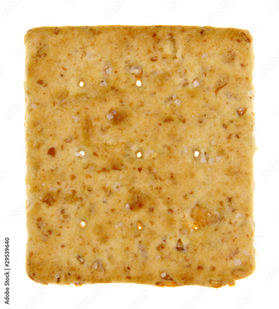 A square whole wheat cracker isolated on white.. A square whole wheat cracker isolated on white..