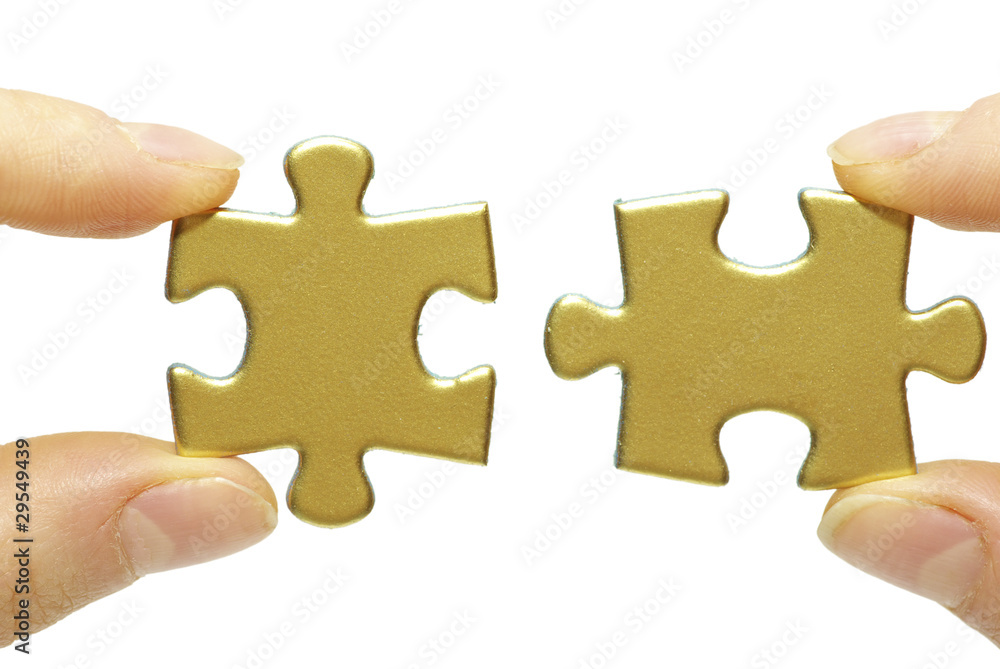 Fototapeta premium puzzle in hands