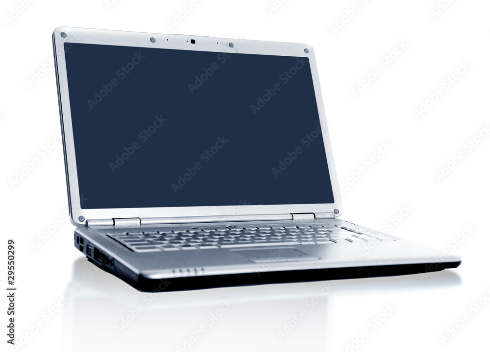 Modern laptop isolated on white with reflections on glass table. Modern laptop isolated on white with reflections on glass table.