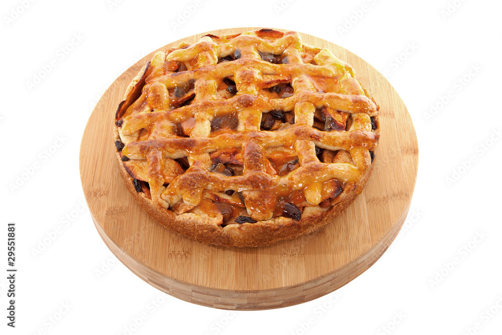 Delicious home baked apple pie on wooden cutting board Delicious home baked apple pie on wooden cutting board