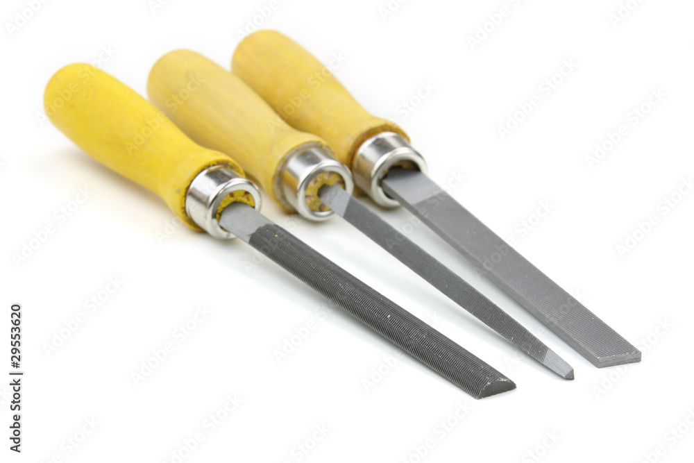 Three different grinding or finishing files on white background Three different grinding or finishing files on white background