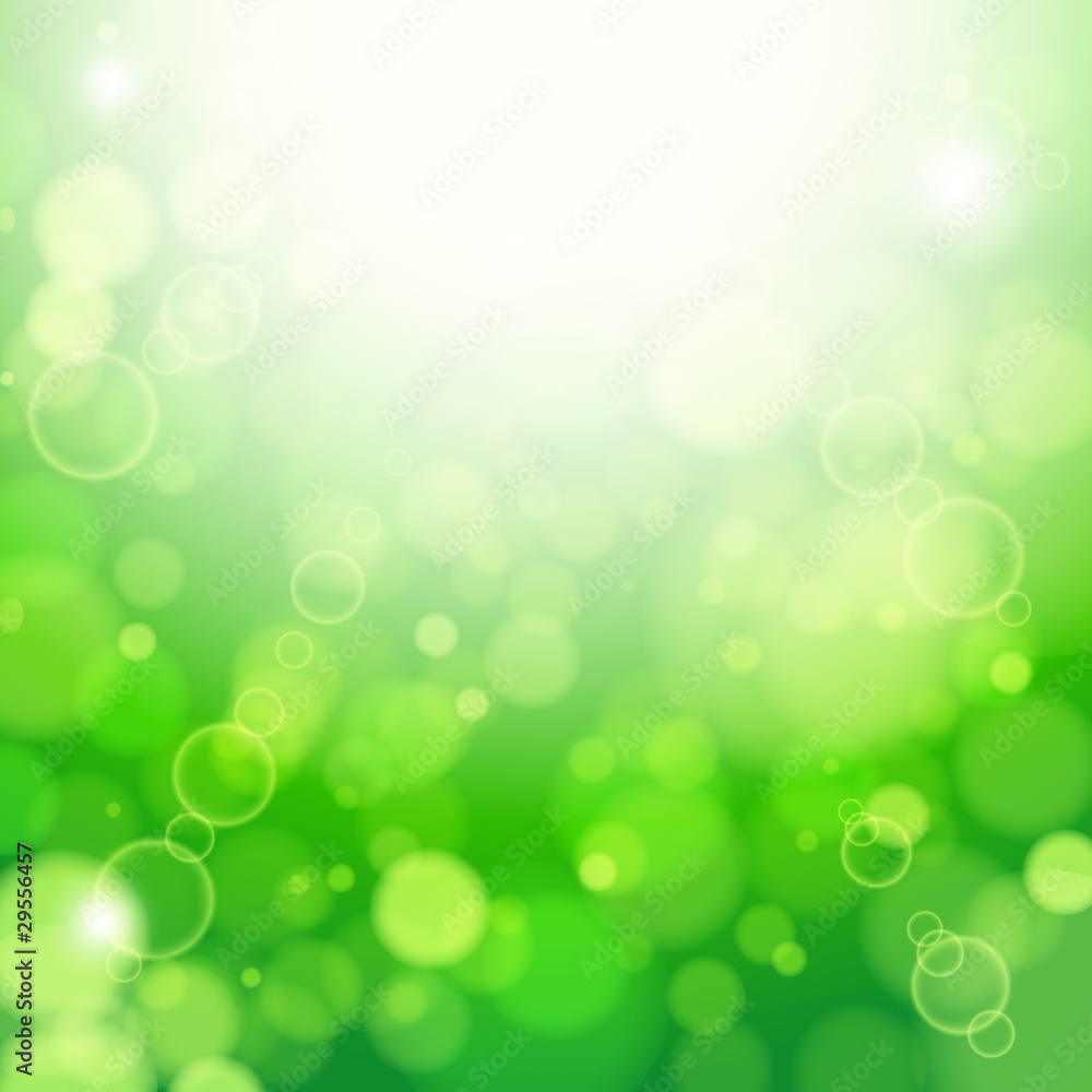 Fototapeta premium Fresh lime blur background with sunlight spots.